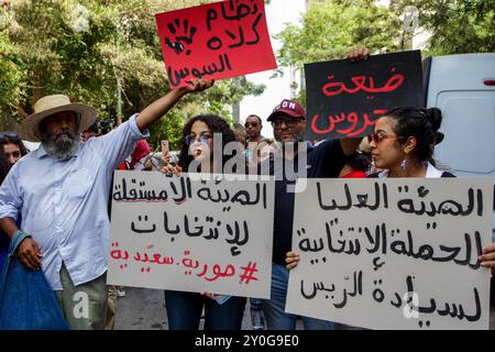 Tunis, Tunisia. 2nd Sep, 2024. Tunis, Tunisia. 02 September 2024. Demonstrators gather to protest outside the headquarters of the High Independent Authority for Elections (ISIE) in Tunis, ahead of the forthcoming presidential election in Tunisia. Participants condemned the recent approval by the ISIE of just three presidential candidates for the October 6 election and the exclusion of three other potential candidates despite being allowed to run by the Administrative Court's ruling. Among those candidates approved by the ISIE are President Kais Saied, Zouhair Maghzaoui, and Ayachi Zammel, Stock Photo