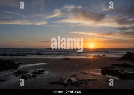 Sunset on Rhosneigr beach, Anglesey, Wales, United Kingdom Stock Photo