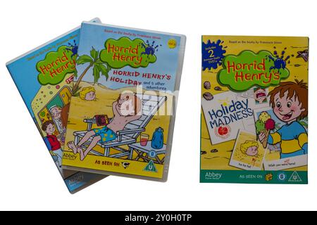 Horrid Henry's Holiday Madness Double DVD Pack DVDs isolated on white background based on the books by Francesca Simon Stock Photo