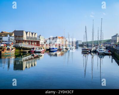 The harbour at Eyemouth in the Borders Region of Scotland on a Spring morning, with working and leisure boats moored at the quays. Stock Photo