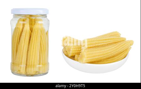 Jar of pickled young baby corn cobs isolated on white background Top view. Flat lay Stock Photo