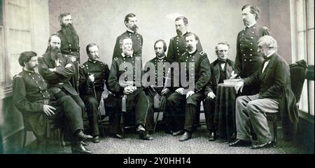 Military commission that tried and convicted the Lincoln conspirators, standing, left to right,: Brig. Gen. Thomas M. Harris, Maj. Gen. Lew Wallace, Maj. Gen. August V. Kautz, and Henry L. Burnett; seated, left to right: Lt. Col. David R. Clendenin, Col. C.H. Tompkins, Brig. Gen. Albion P. Howe, Brig. Gen. James Ekin, Maj. Gen. David Hunter, Brig. Gen. Robert S. Foster, John A. Bingham, and Brig. Gen. Joseph Holt. Stock Photo