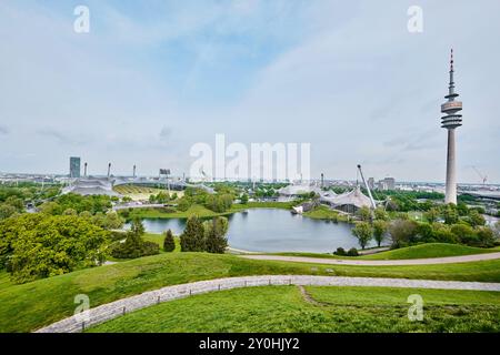 Munich, Germany - April 18, 2024: View of Olympia Park with Olympia Tower Olympiaturm in Munich Stock Photo