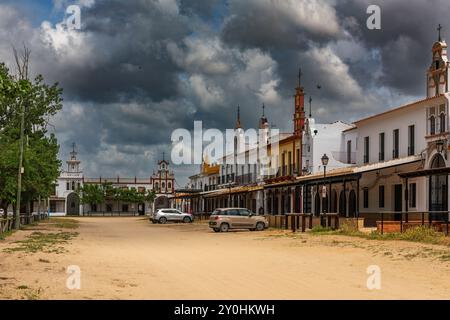 Sand street and brotherhood buildings in El Rocio, Andalusia, Spain Stock Photo