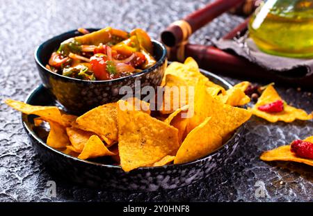 Nachos with guacamole and vegetables. Original Mexican recipe. Stock Photo
