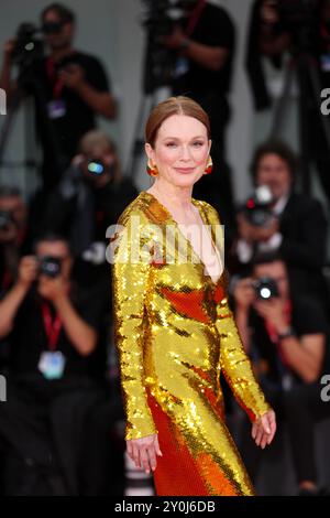 Venice, Italy. 2nd Sep, 2024. Actress Julianne Moore poses for a photo at the red carpet before the premiere of the film 'The Room Next Door' during the 81st Venice Film Festival in Venice, Italy, on Sept. 2, 2024. Credit: Li Jing/Xinhua/Alamy Live News Stock Photo