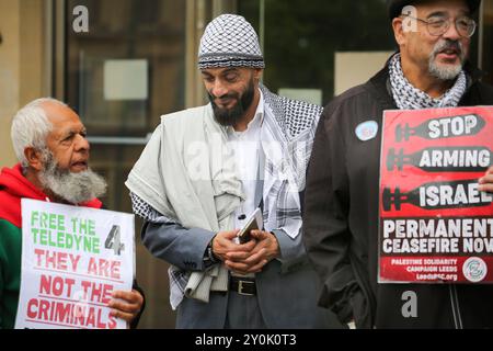 Bradford, UK. 02nd Sep, 2024. One of the defendants (centre) joins the protesters during the demonstration outside court. Four Palestine Action activists started their trial at Bradford Crown Court on Monday 2 September after occupying and allegedly causing damage to the roof at Teledyne in Shipley in April 2024. The protesters took direct action as Teledyne make components for the F-35 fighter jet used by Israel against the Palestinian people in Gaza and elsewhere. The court case is scheduled to last a week Credit: SOPA Images Limited/Alamy Live News Stock Photo