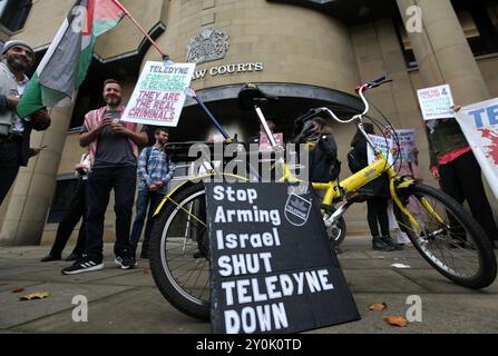 Bradford, UK. 02nd Sep, 2024. Protesters against Teledyne and for the defendants stand outside court during the demonstration. Four Palestine Action activists started their trial at Bradford Crown Court on Monday 2 September after occupying and allegedly causing damage to the roof at Teledyne in Shipley in April 2024. The protesters took direct action as Teledyne make components for the F-35 fighter jet used by Israel against the Palestinian people in Gaza and elsewhere. The court case is scheduled to last a week Credit: SOPA Images Limited/Alamy Live News Stock Photo