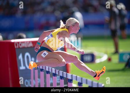 Liz Clay participating in the 100 meters hurdles at the Paris 2024 Olympic Games. Stock Photo