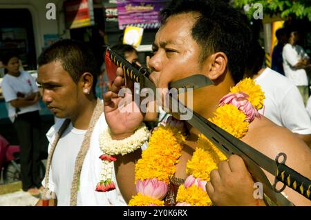 The unique and bizarre Vegetarian festival in Phuket, Thailand. Stock Photo