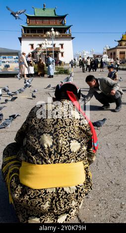 Mongolian nomads visit the Gandantegchinlen Monastery in Ulaanbaatar, Mongolia. Stock Photo