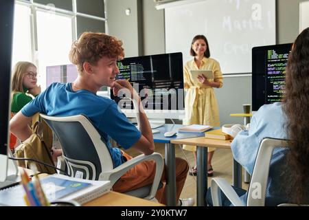 Students Talking during IT Class Stock Photo