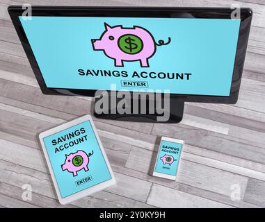 Savings account concept shown on different information technology devices Stock Photo