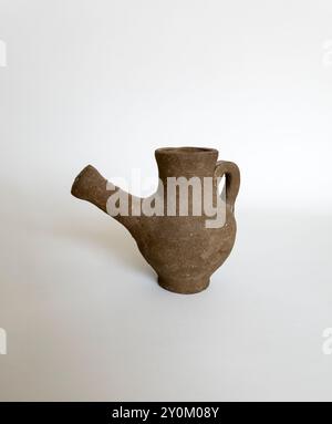 Miniature old water jug Stock Photo