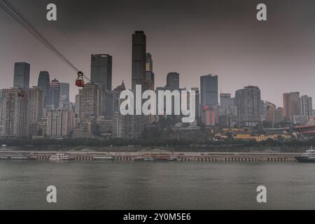 JANUARY 25, 2021, CHONGQING, CHINA: The skyscrapers and cable car in Chongqing, China Stock Photo