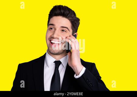 Portrait of excited charming millennial marketer entrepreneur have dialogue colleagues friends laugh feel candid use user modern technology dressed Stock Photo