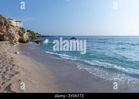 Kargicak beach view, Turkey. Coastal landscape with shore waves under blue sky Stock Photo