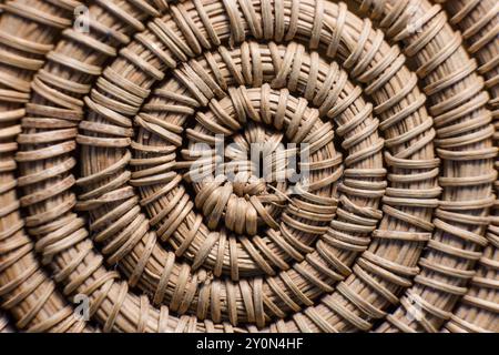 Macro photography of the intricate weave of a traditional basket  made in natural material. Stock Photo