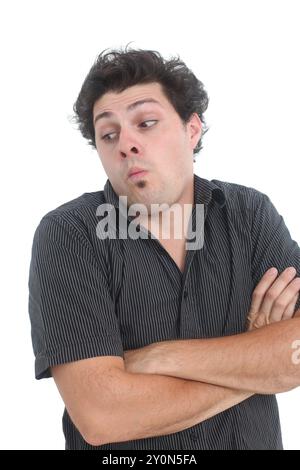 young man with clueless face expression playing innocent on white background Stock Photo