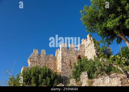 Landscape with walls and landward fortress on a sunny summer day. Alanya Kale, Turkey. It was built in the 13th century Stock Photo