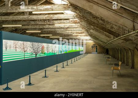 DAVID HOCKNEY A YEAR IN NORMANDIE in the Roofspace of Salts Mill in Saltaire Village of Saltaire Bradford West Yorkshire England UK GB Europe Stock Photo