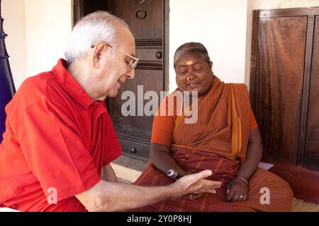 Man having his palm read, Dakshina Chitra, Chennai, Tamil Nadu, India Stock Photo