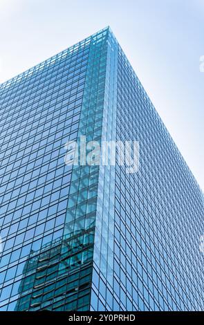 Detail of a modern office and apartment building. Glass building office in the center of Osaka, Japan Stock Photo