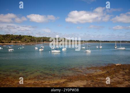 Boats at Anchor off Les Sept Iles, Near Baden, Gulf of Morbihan, Brittany, France Stock Photo