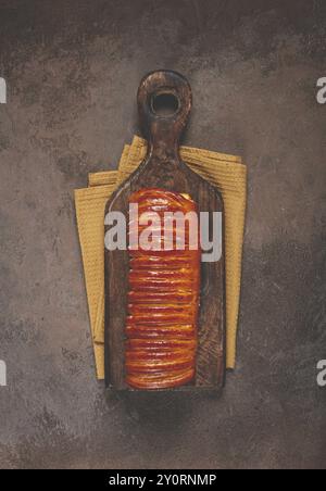 Sweet braided roll, stuffed with jam and raisins, pastries, sweet bread with filling, sweet pie, no people Stock Photo