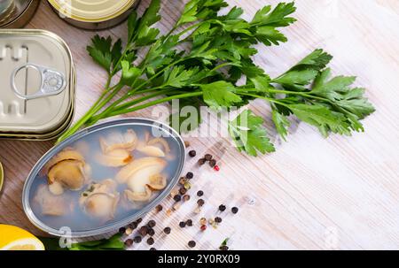 Canned seafood, whole shelled clams Stock Photo