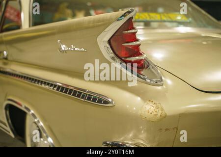 Vintage DeSoto Car Tailfin with Chrome Trim. High quality photoA close-up of a vintage DeSoto car tailfin highlights its distinctive, sharp design, wi Stock Photo