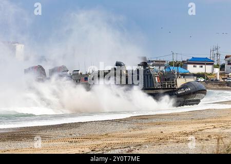 U.S. Marines and Navy Sailors with 15th Marine Expeditionary Unit make first contact with land while executing a ship to shore movement on a Landing Craft Air Cushion (LCAC) during exercise Ssang Yong 24 in Pohang, South Korea, Sept. 1, 2024. Exercise SY24 strengthens the Republic of Korea-U.S. alliance through bilateral, joint training, contributing toward combined amphibious capability in defense of the Korean Peninsula. (U.S. Marine Corps photo by Cpl. John J. Simpson) Stock Photo