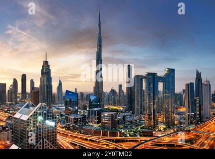 Dubai skyline at sunset with Burj Khalifa - aerial view, United Arab Emirates Stock Photo