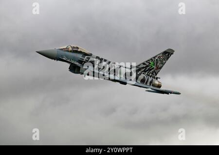 Luftwaffe Eurofighter Typhoon EF2000 3106 from Taktisches Luftwaffengeschwader 74 from Neuburg Air Base in Bavaria departs RAF Fairford after the RIAT Stock Photo