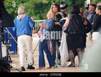 Joanna Page, who plays Stacey Shipman (2nd left) during filming for the Gavin and Stacey Christmas Day special at Barry in the Vale of Glamorgan, Wales. Picture date: Wednesday September 4, 2024. Stock Photo