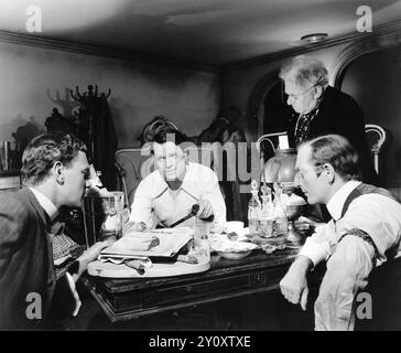 Orson Welles (second to left) - Promotional still for the 1941 film, Citizen Kane 1941 - RKO Radio Pictures, still photographer Alexander Kahle Stock Photo