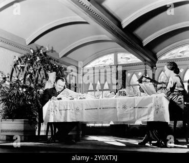 Orson Welles, Warrick,, breakfast - Promotional still for the 1941 film, Citizen Kane - RKO Radio Pictures, still photographer Alexander Kahle Stock Photo