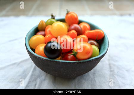 Cherries in dish on the table Stock Photo