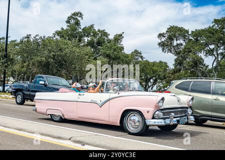 Gulfport, MS - October 07, 2023: Wide angle front corner view of a 1955 Ford Fairlane Sunliner Convertible at a local car show. Stock Photo