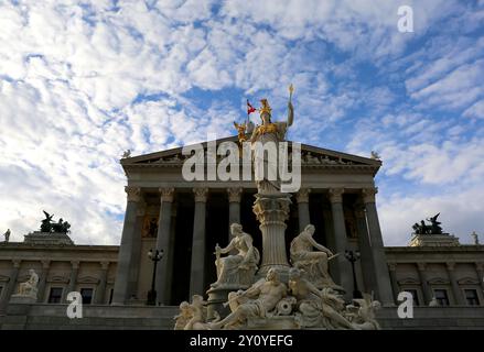 VIENNA, AUSTRIA-NOVEMBER 14,2023:The Pallas Athena Statue in front of Parliament Building built from 1874-1883 in The Hellenistic Style Stock Photo