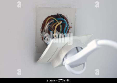 Exposed Electrical Outlet with Wires Stock Photo