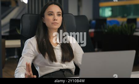 Pensive serious thinking ponder Caucasian businesswoman female office worker manager employer secretary specialist smile business woman girl lady Stock Photo