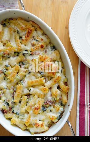 Homemade macaroni gratin made with zucchini and ham, top view Stock Photo