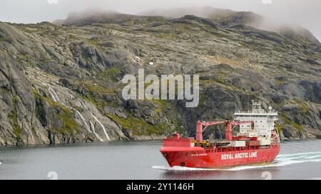 Prince Christian Sound, Greenland - 28 August 2024: Cargo supply ship Malik Arctica sailing on a fjord in Prince Christian Sound in Greenland Stock Photo