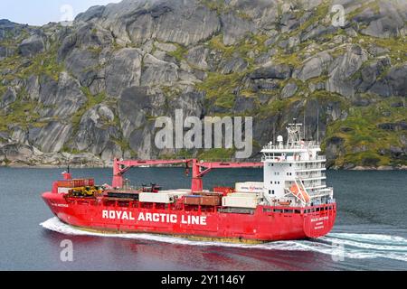 Prince Christian Sound, Greenland - 28 August 2024: Cargo supply ship Malik Arctica sailing on a fjord in Prince Christian Sound in Greenland Stock Photo