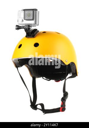 Modern action camera on helmet against white background Stock Photo