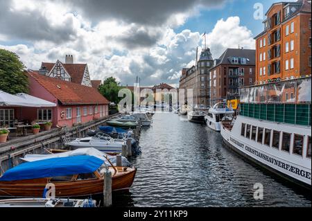 Copenhagen, Denmark, July 24, 2024 - View over a canal at the Nyhavn in the historical city center Stock Photo