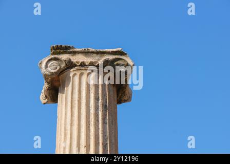 Izmir, Turkey. Greco-Roman column of the historic ancient city of Ephesus with blue sky in the background. Archeological Site in Selcuk. Stock Photo