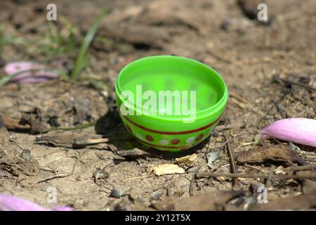 half of green plastic easter egg decoration Stock Photo