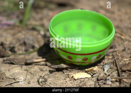 half of green plastic easter egg decoration Stock Photo